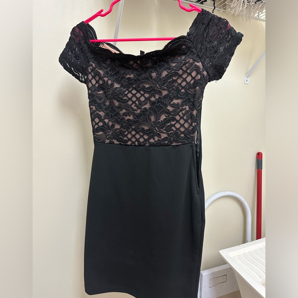 Women’s formal/cocktail black off the shoulder dress with lace.
